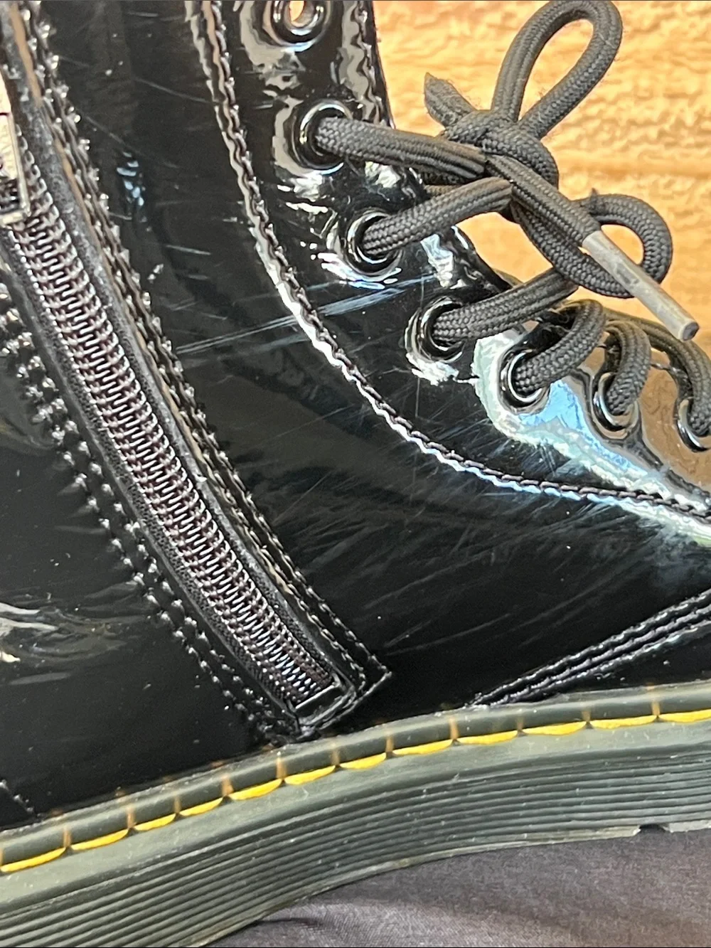 Dr. Martens Kids Black Patent Lace-Up Zip Combat Boots with Yellow Stitching